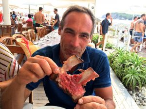 Mike eats meat in Ibiza